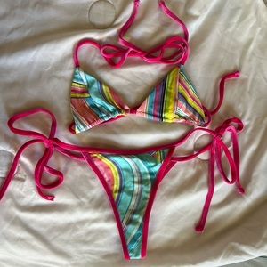 Frankie’s Bikinis Phillipa Shine Micro Triangle Bikini in Rainbow Swirl